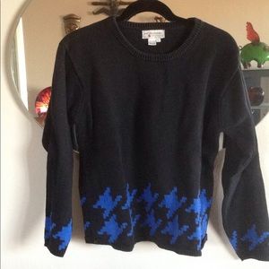 Black and blue sweater.